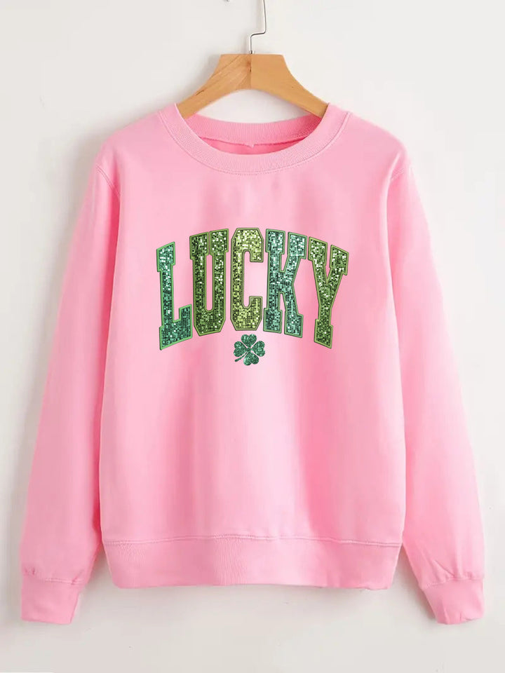 Dame uformell sweatshirt med glitrende skrift og firkløvermotiv Skjora