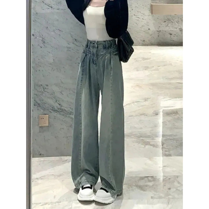 Kvinners vide høytekkede jeans med elegant midjebånddesign Skjora