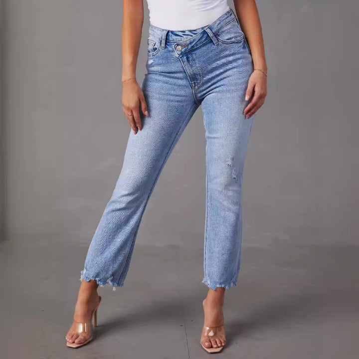 Kvinne høyt liv jeans med trendy frynser og slitte detaljer Skjora