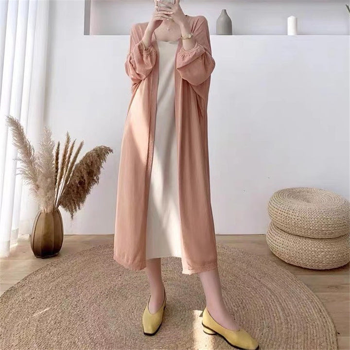 Dames Elegant lang cardigan med ballongformede ermer og åpen front Skjora