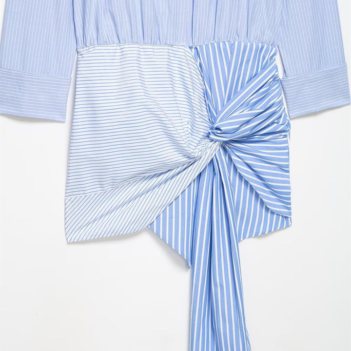 Damebluse med asymmetrisk knute og raffinert drapering Skjora