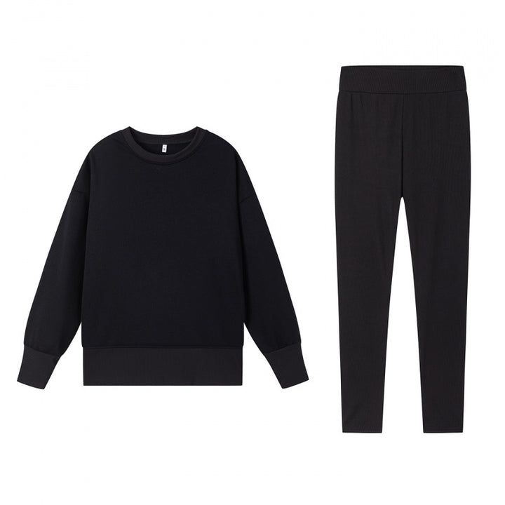 Komfortabelt treningstøy for kvinner med romslig genser og tettsittende leggings Skjora