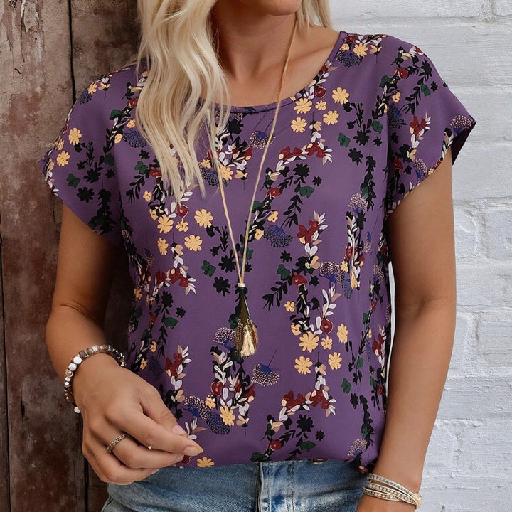Dame chiffonbluse med blomsterdesign og vid snitt Skjora