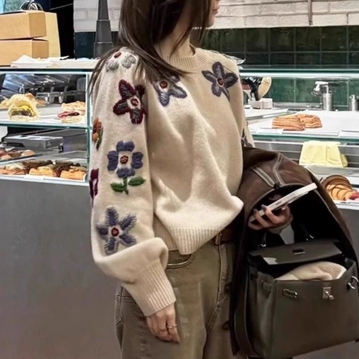 Kvinnes Elegant Strikkegenser med Blomsterbroderi Design og Avslappet Snitt Skjora
