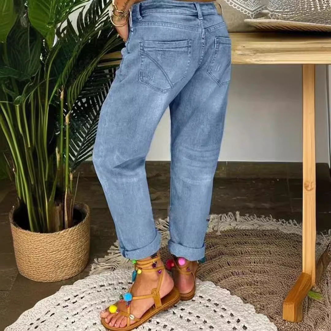Kvinne Mom Jeans med knappelukking og stilige slitte detaljer