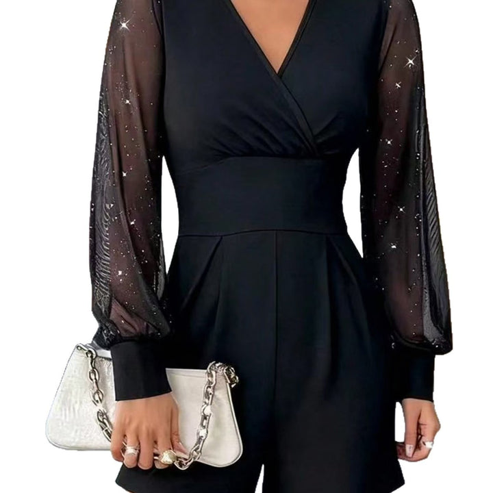 Dame elegant jumpsuit med transparente puffermer og V-hals Skjora