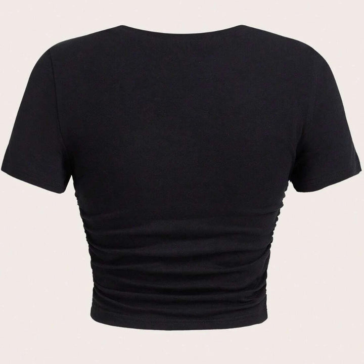 Damer cropped T-skjorte med glitrende skrifttype og trendy bomullsmateriale Skjora