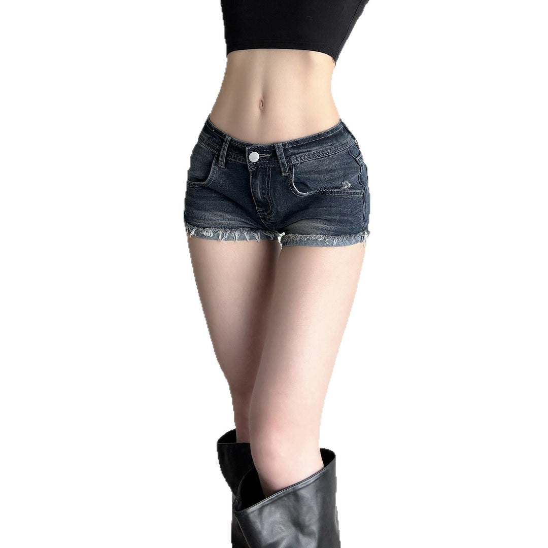 Dame denim-shorts med frynset kant skjorte
