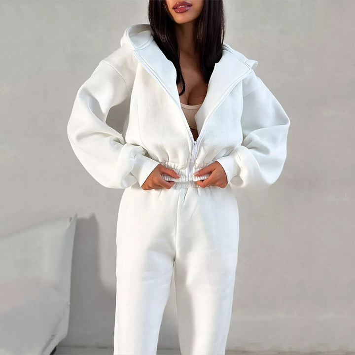 Kvinners sporty fleece jumpsuit med hette og løs passform Skjora