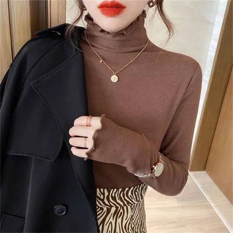 Kvinne Langermet Turtleneck Top med Fin Ribbestrikk Design og Ledig Passform