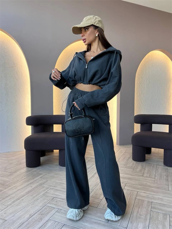 Kvinnors sportiga crop top och lösa joggingsbyxor set Skjora