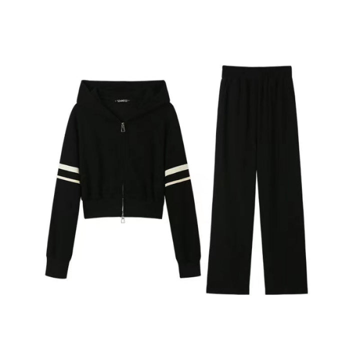 Kvinne sporty hettegenser og joggebukse sett med sporty glidelås og bred passform Skjora