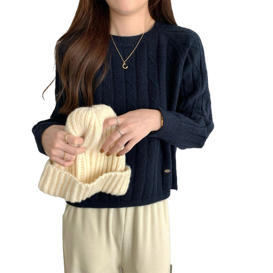 Dame chunky strikkegenser med strukturmønster og avslappet snitt Skjora