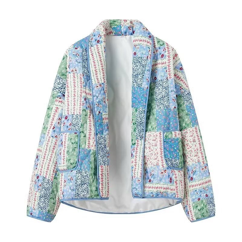 Dames Patchwork Polstret Jakke med Blomstermønster og Praktiske Sidelommer Skjora