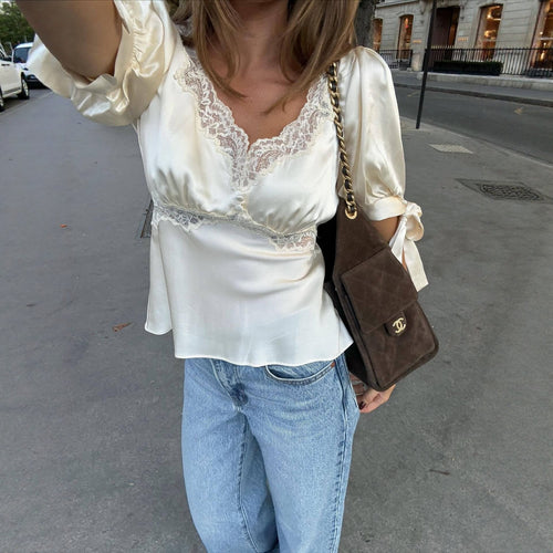Ladies' satin blouse with pointed details Skjora