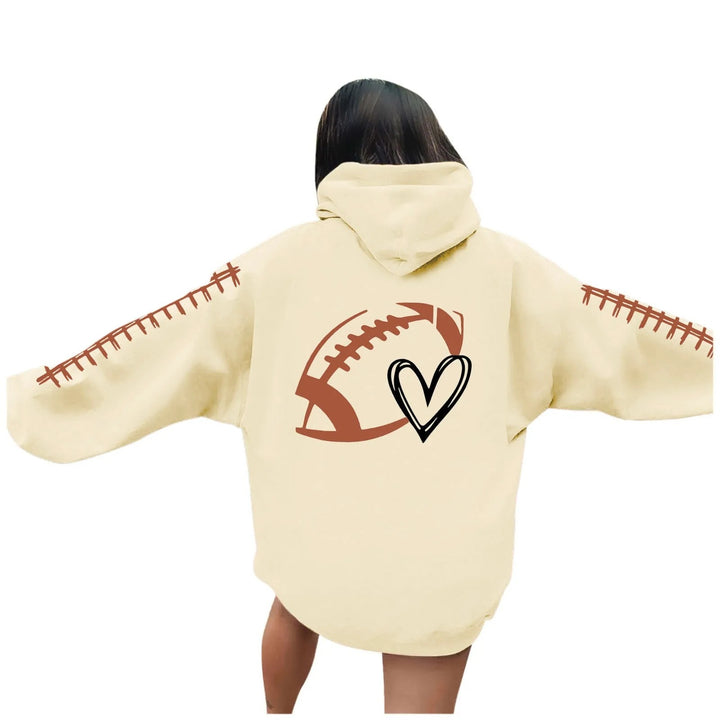 Damehoodie med kreativ fotballmotiv og avslappet passform Skjora