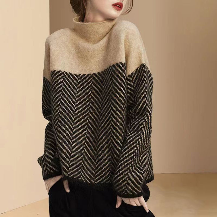Damegenser med høy krage og moderne bikake-mønster Skjora