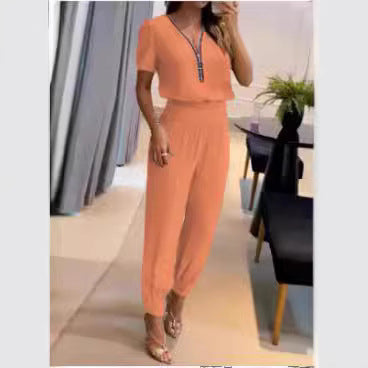 Damer Løs jumpsuit med elegant V-hals og perfekt passform Skjora