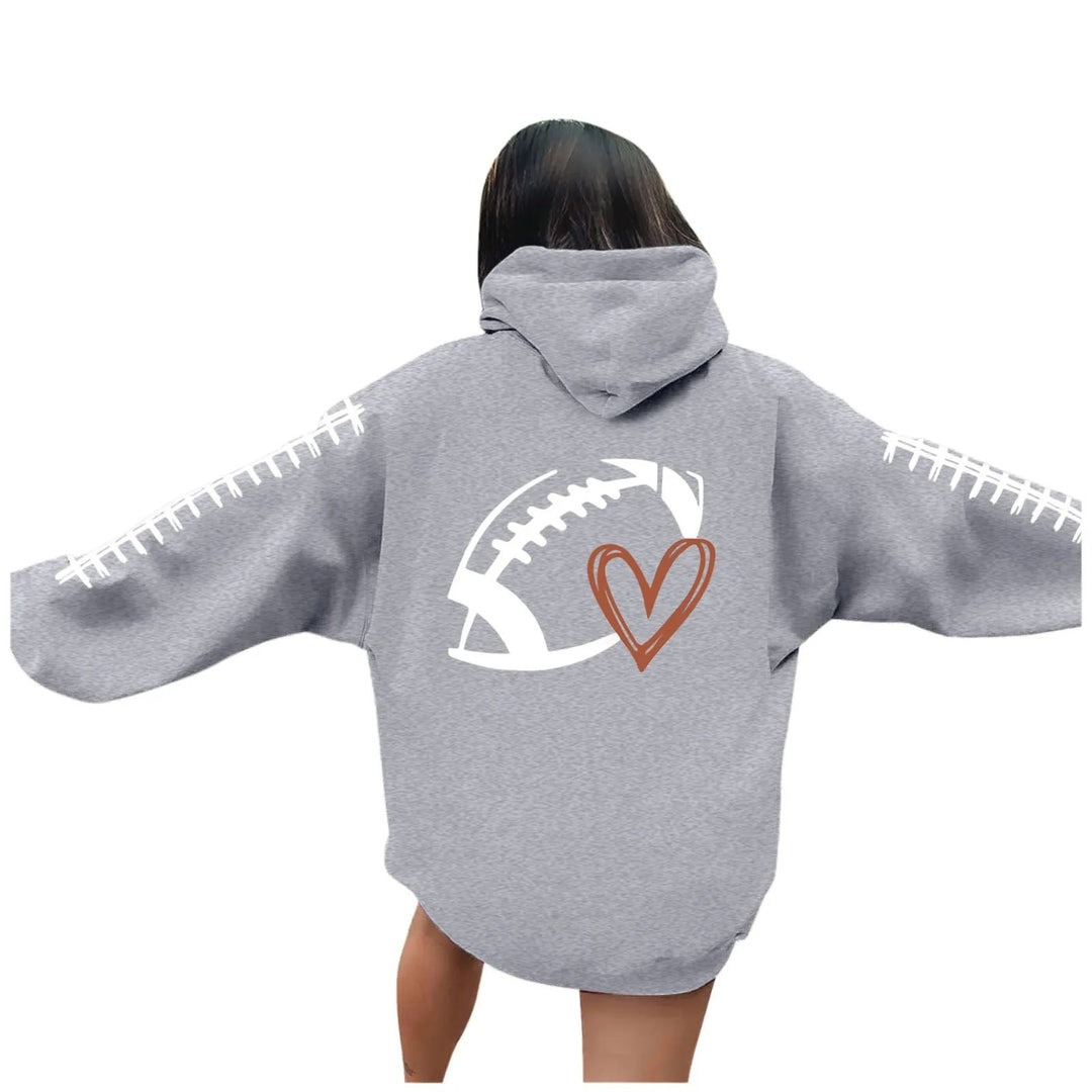 Damehoodie med kreativ fotballmotiv og avslappet passform Skjora