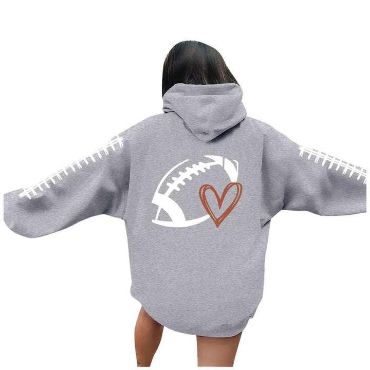 Damehoodie med kreativ fotballmotiv og avslappet passform Skjora