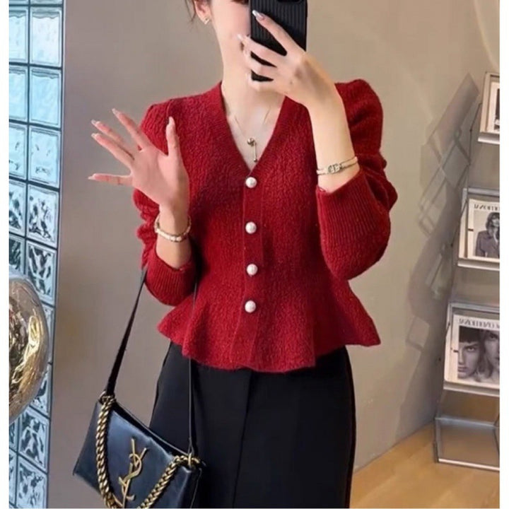 Dame cardigan med dekorative knapper og elegant snitt Skjora