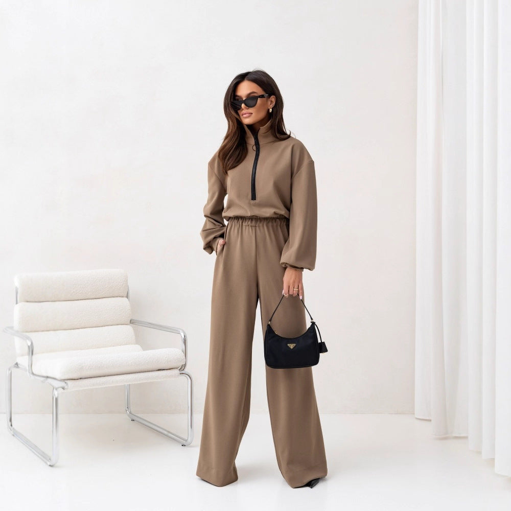 Damer sporty jumpsuit med høy krage og moderne glidelås Skjora
