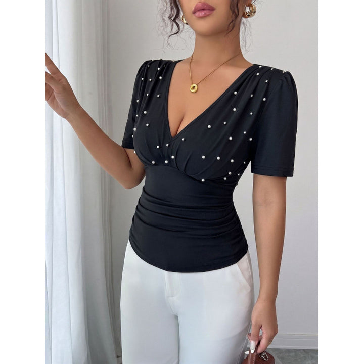 Dame elegant bluse med perle-detalj Skjora