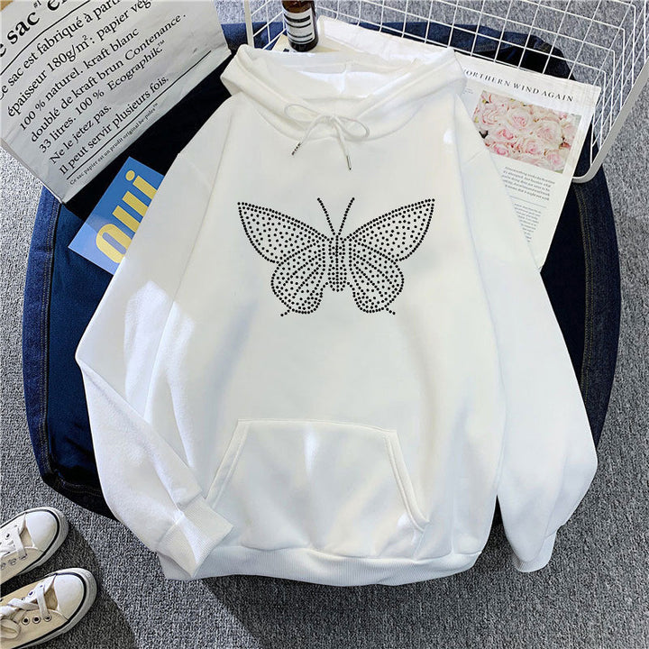 Dame hettegensere med elegant sommerfugldesign Skjora