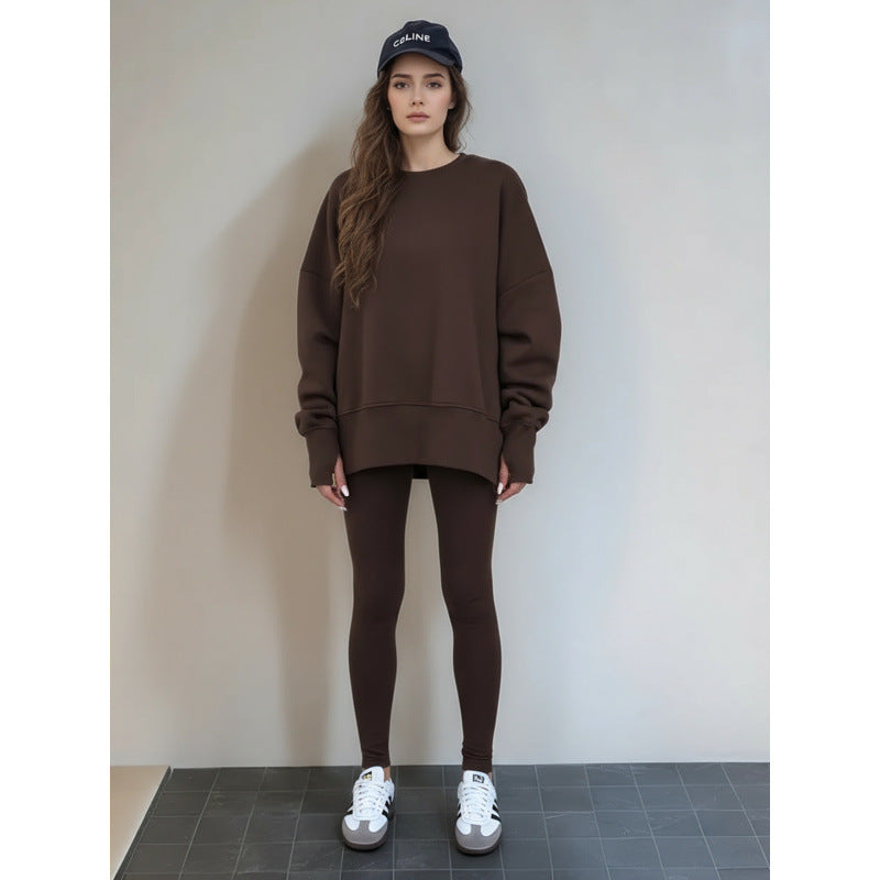Komfortabelt treningstøy for kvinner med romslig genser og tettsittende leggings Skjora