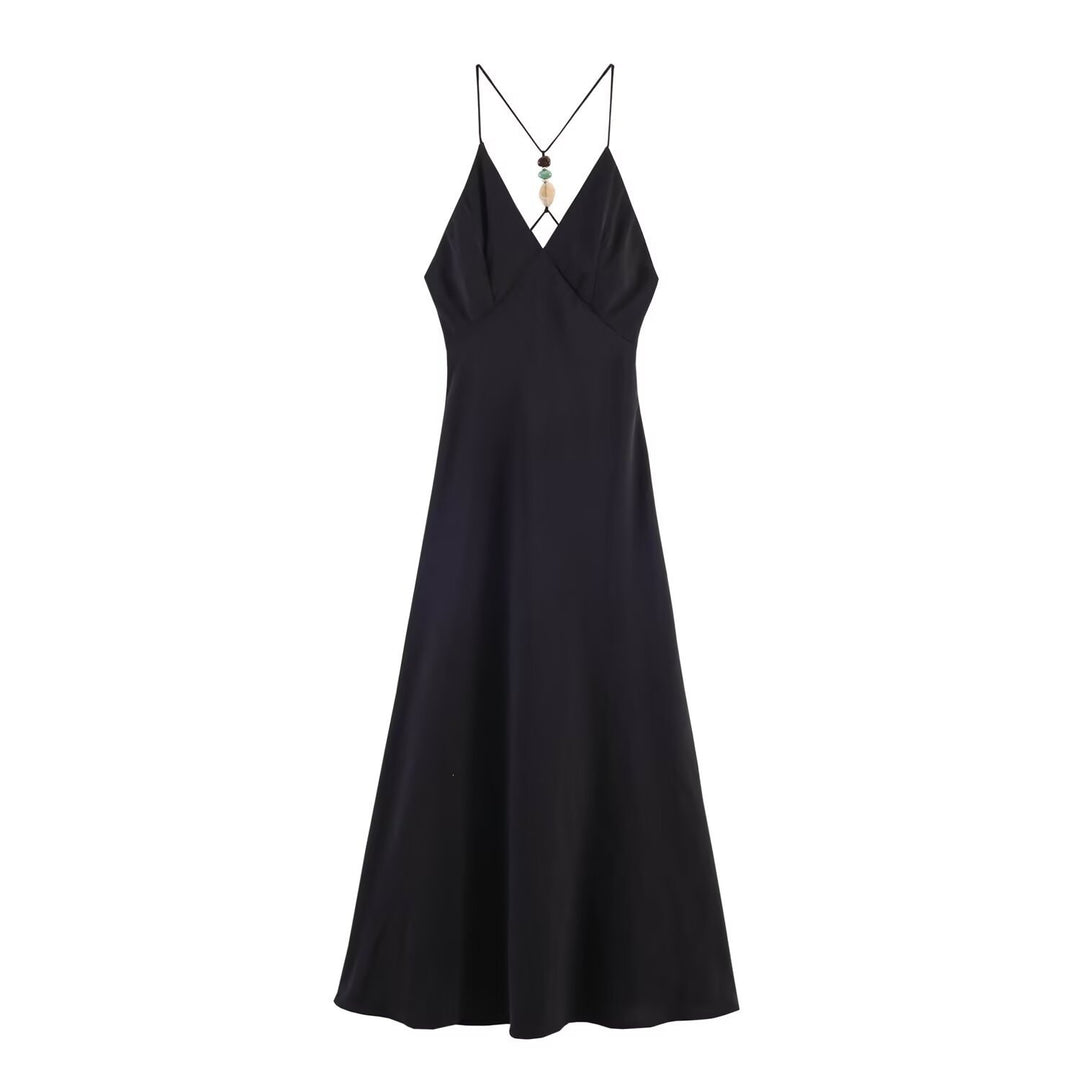 Dame Maxikjole med delikat spaghetti stroppdesign og elegant drapering Skjora