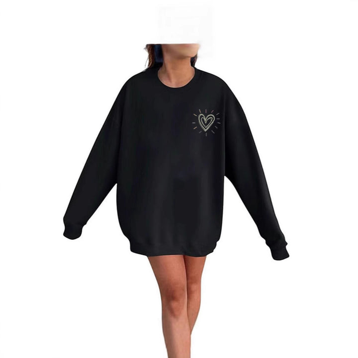 Dame Oversized Sweatshirt med søtt hjerte-motiv og avslappet snitt Skjora