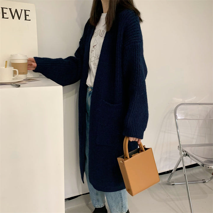 Kvinnes Plus Size Strikket Cardigan med Casual Snitt og Lommer Skjora