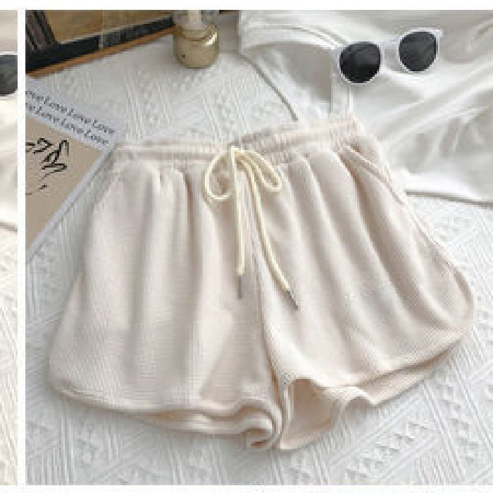 Kvinnelige casual shorts med vaffelstruktur og justerbar snorlås og elastisk midjebånd