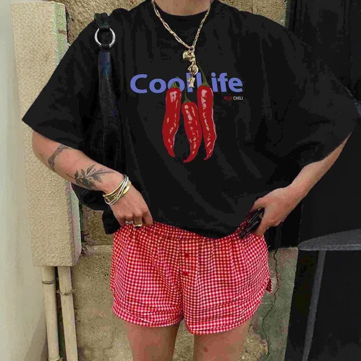 Damer oversized T-skjorte med kreativt chili-motiv og avslappet snitt Skjora