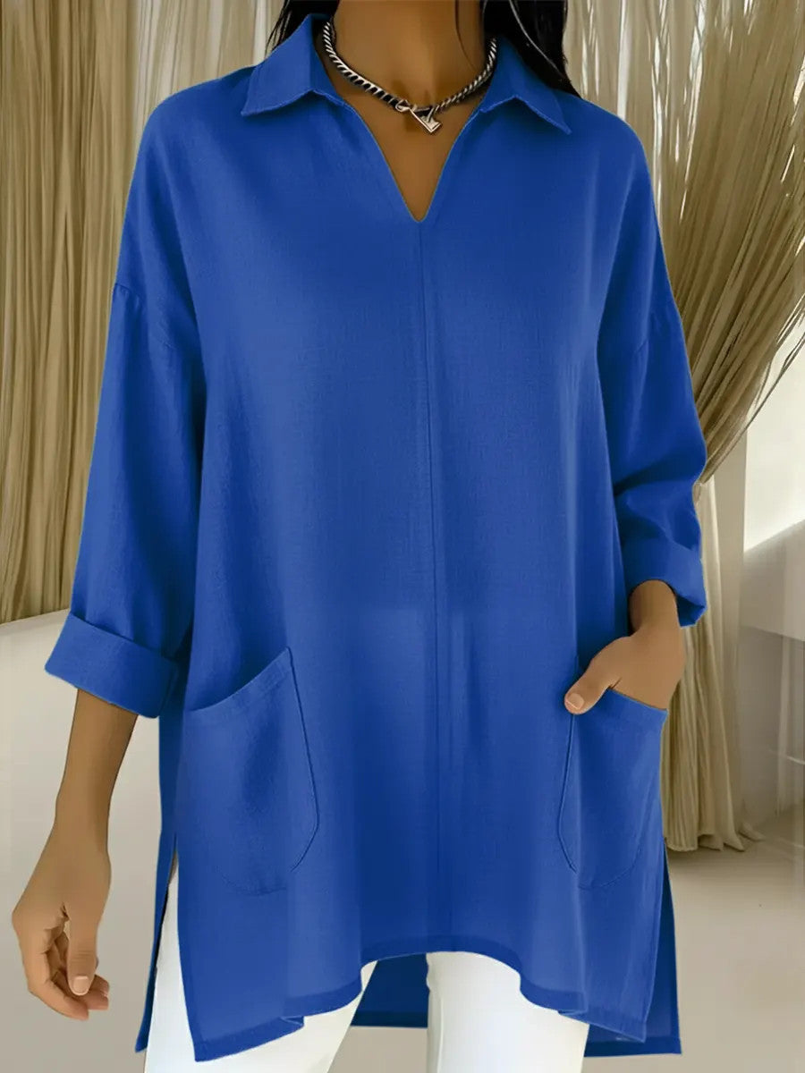 Dame langermet bluse med elegant V-hals og praktiske lommer Skjora