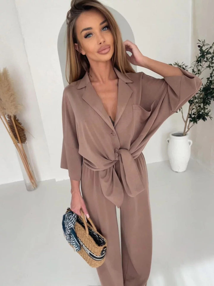 Kvinnelig elegant omslags jumpsuit med knappedetaljer Skjora