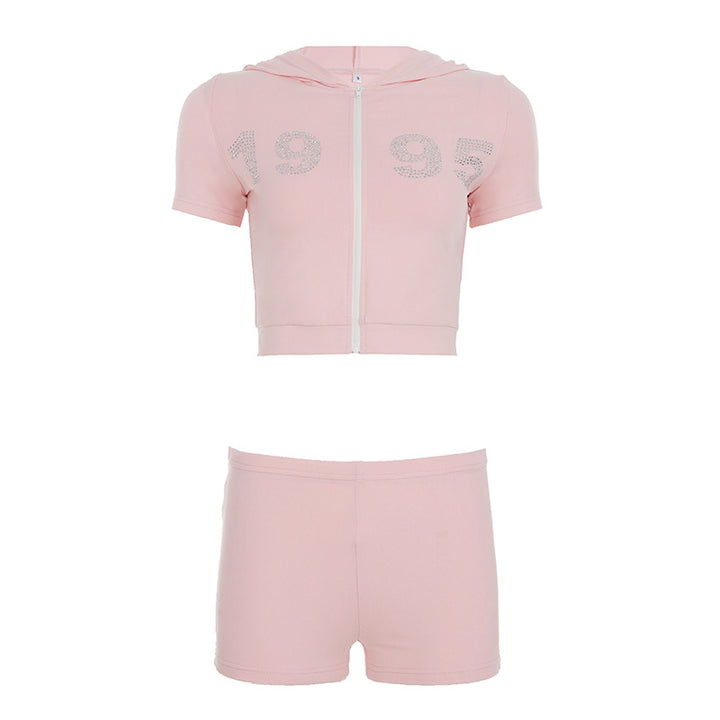 Dame sporty todelt sett med hettegenser og korte shorts Skjora