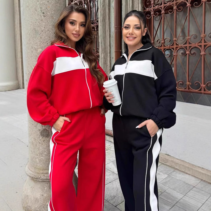 Kvinnelig sporty fleece treningsdrakt med hel glidelås og elastiske mansjetter Skjora