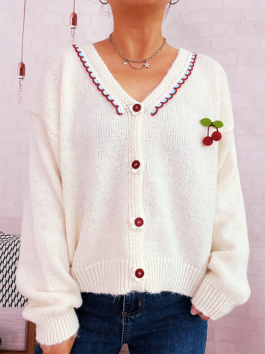 Dame koselig cardigan med lekent blomsterdesign og knappedetaljer Skjora