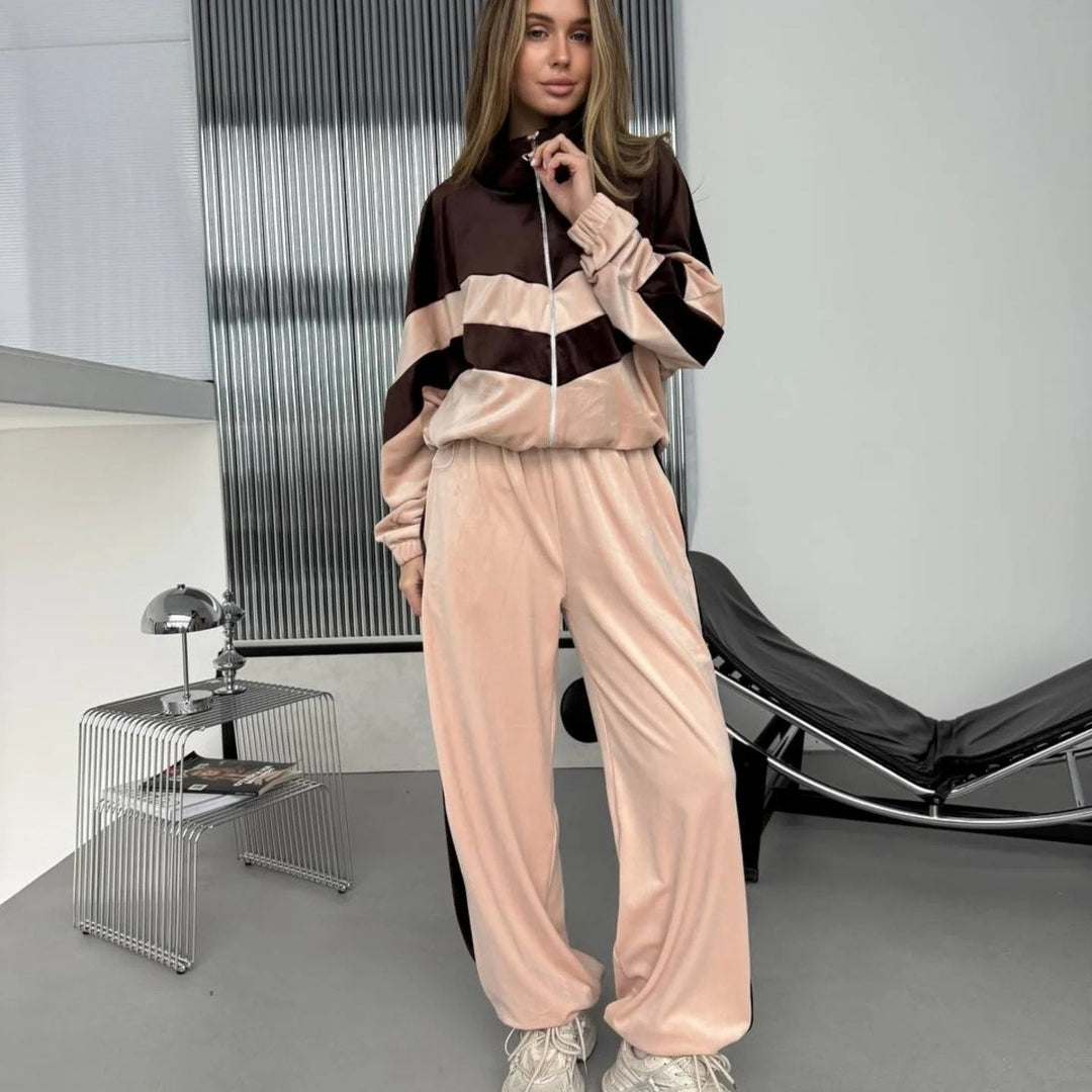 Dame sporty velur treningsdrakt med elegant glidelås og moderne striper Skjora