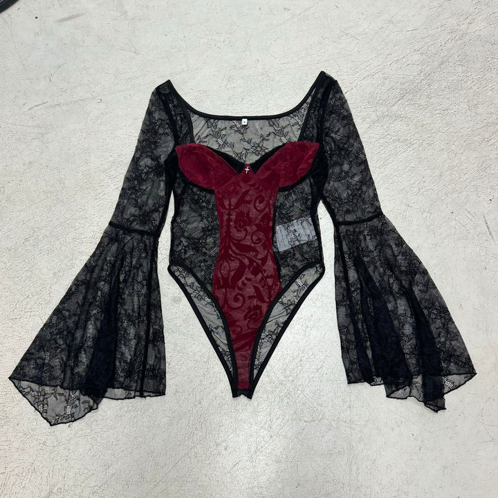 Dame spisse bodysuit med voluminøse ermer og elegante dekorasjoner Skjora