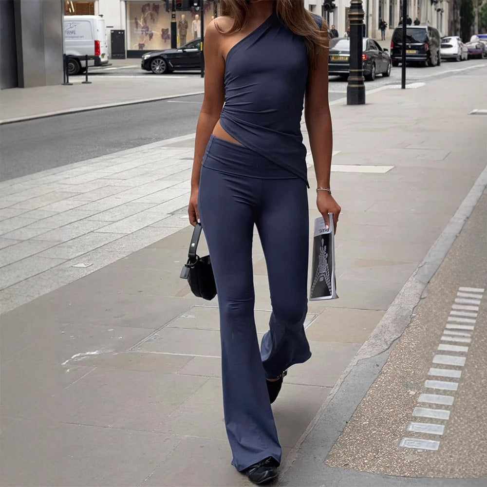Damer Elegant Jumpsuit med asymmetrisk design og dekorativ taillering Skjora