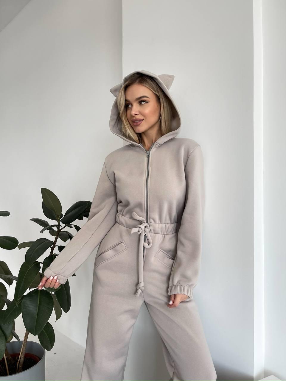 Kvinnenes koselige fleece jumpsuit med hette og søte ører Skjora