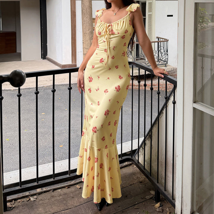 Dame maxi kjole med blomstrete volanger og elegant snitt Skjora