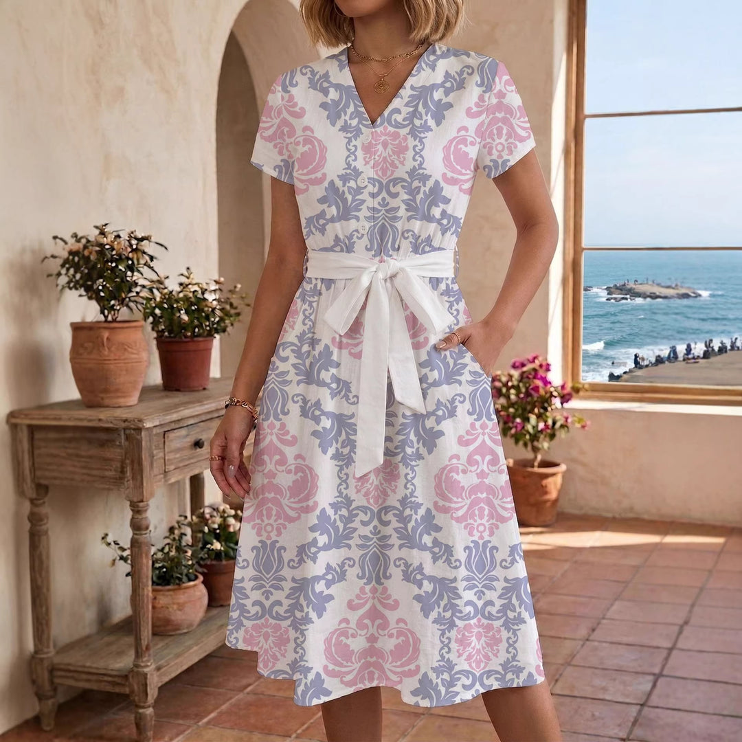 Damen Sommerliches Kleid mit taillierbarem Bindegürtel und floralem Muster Skjora