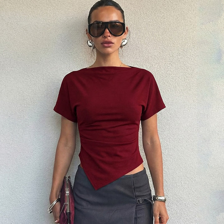 Dame Trendy topp med asymmetrisk kant og figurformende snitt Skjora