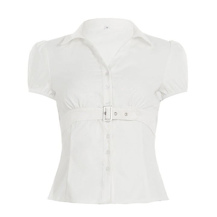 Damebluse med innsvingt snitt og elegant belteakcent Skjora