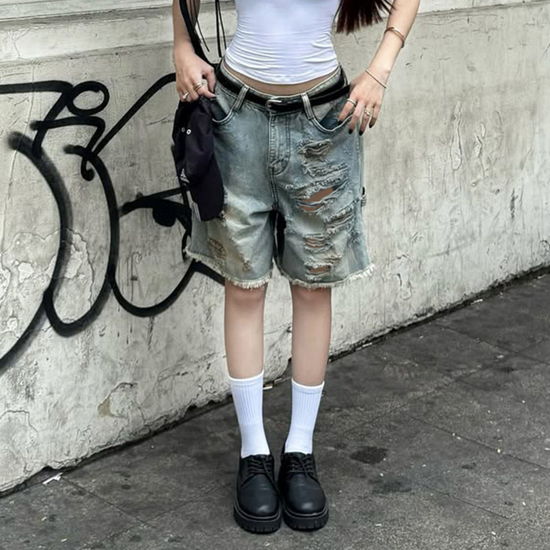 Dame Z ødelagte denimshorts med høy midje og flikete kanter Skjora