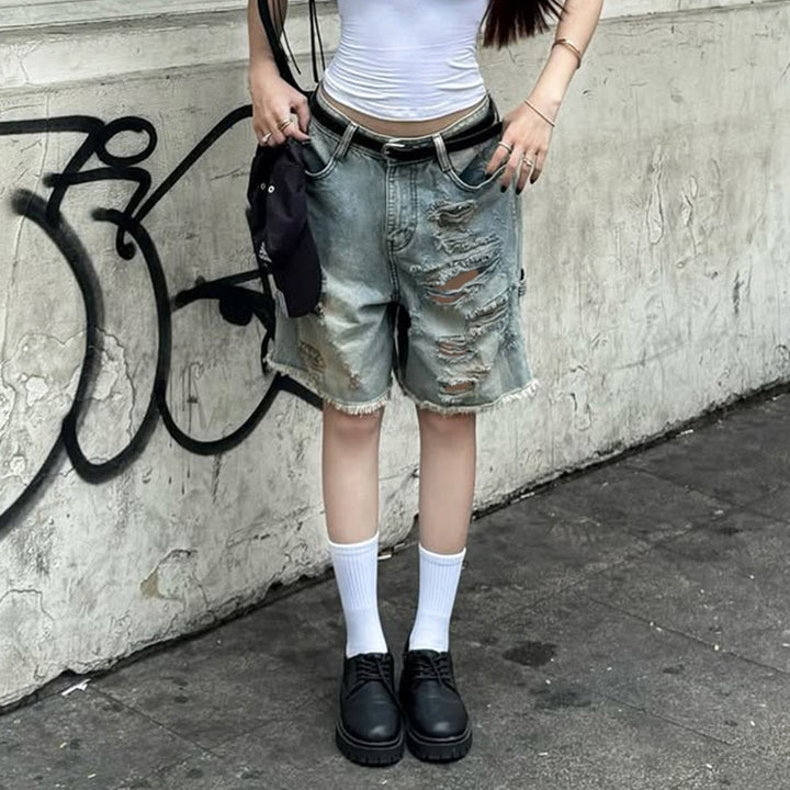 Dame Z ødelagte denimshorts med høy midje og flikete kanter Skjora