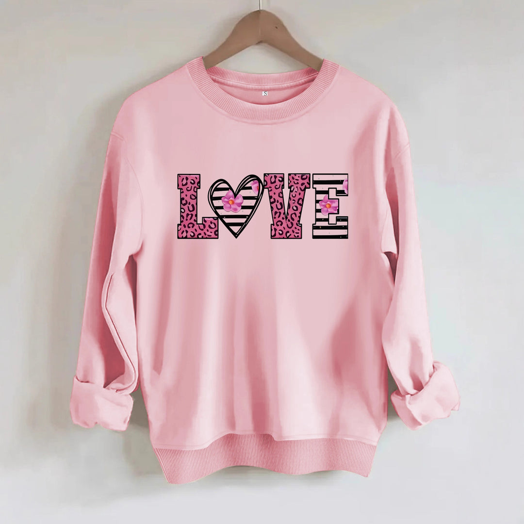Dame sweatshirt med moderne leopard hjerte-design og behagelig passform Skjora